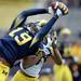 Michigan tight end Devin Funchess makes a catch around  defensive back Jeremy Clark during spring practice at Michigan Stadium on Saturday, April 13, 2013. Melanie Maxwell I AnnArbor.com